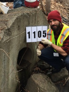 Student volunteers assist the Town of Lexington with monitoring outfalls for illicit discharges. Photo by Town of Lexington